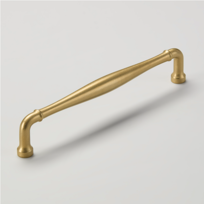 Featured image of Croft’s latest British-made hardware collection, showcasing a brushed brass cabinet pull handle with curved detailing on a neutral background.