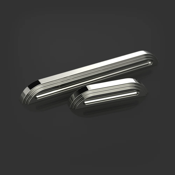 Art Deco style furniture hardware cabinet handles in chrome finish with bold geometric stepped detailing on dark background.