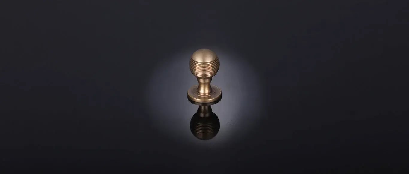 Reeded ball cabinet knob by Samuel Heath