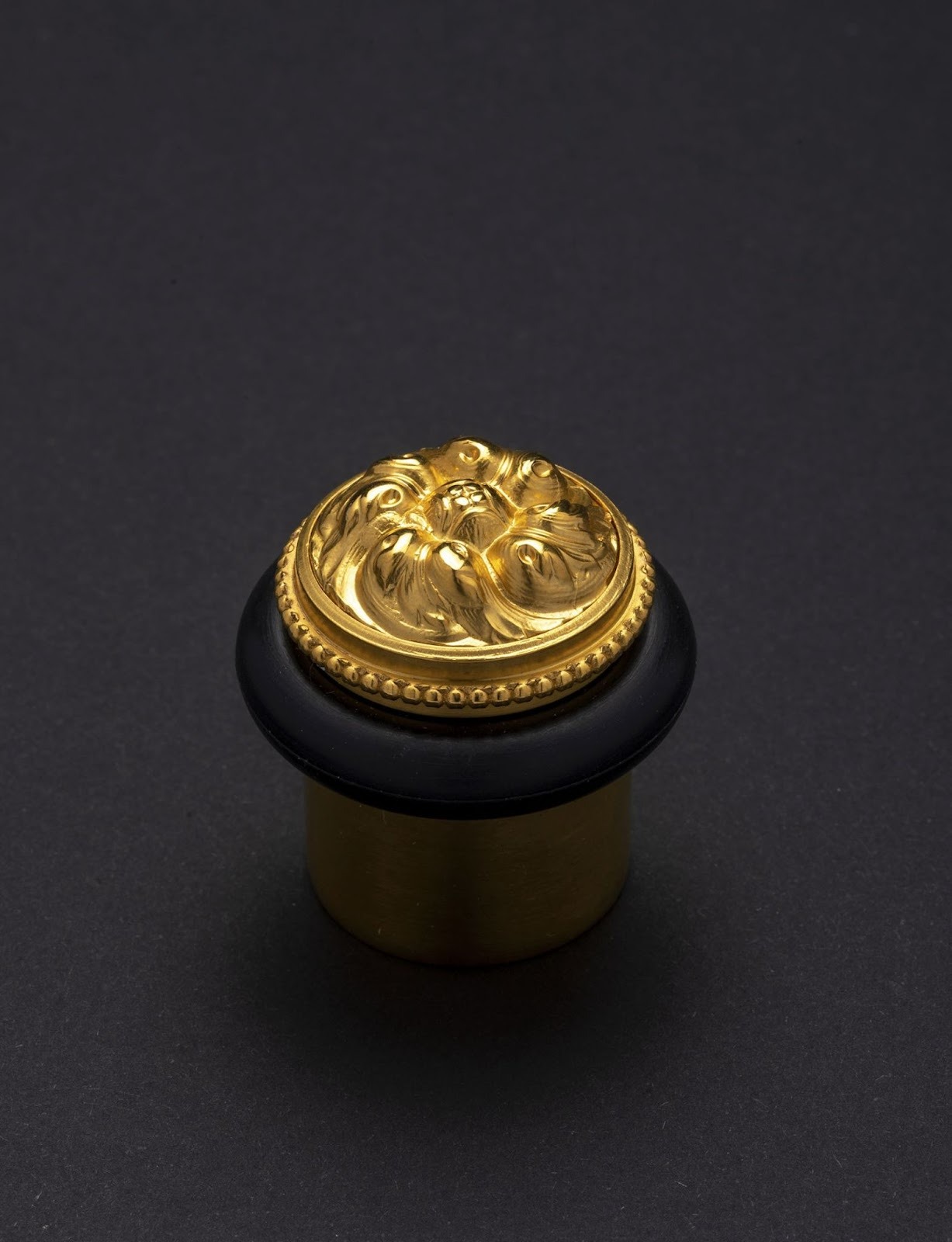 A 4472 doorstop in the Louis XVI style, an example of hand-crafted ironmongery.