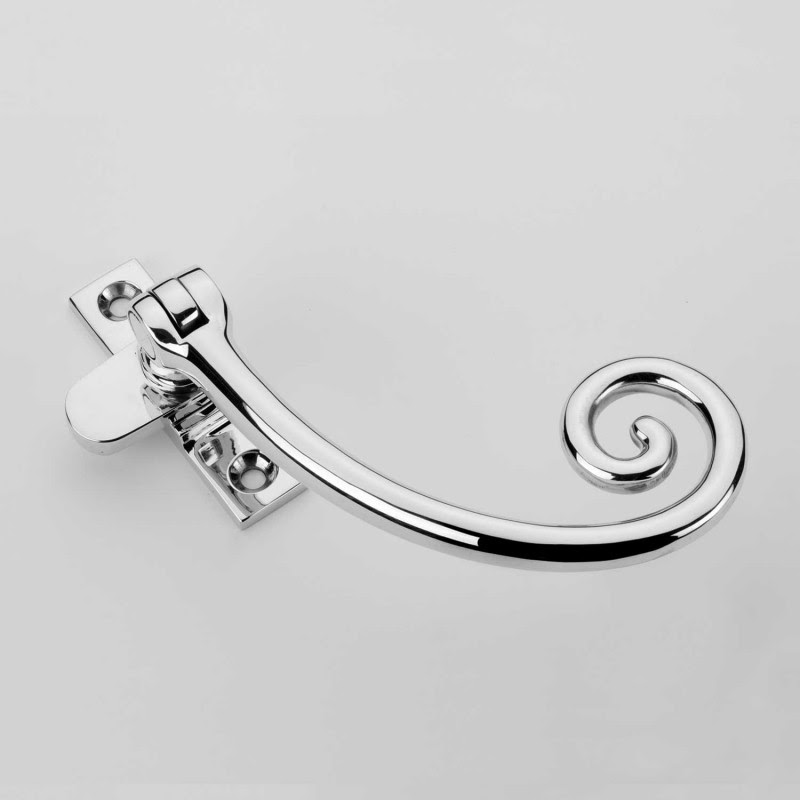 Polished chrome traditional window hardware handle inspired by Britain's architectural heritage.