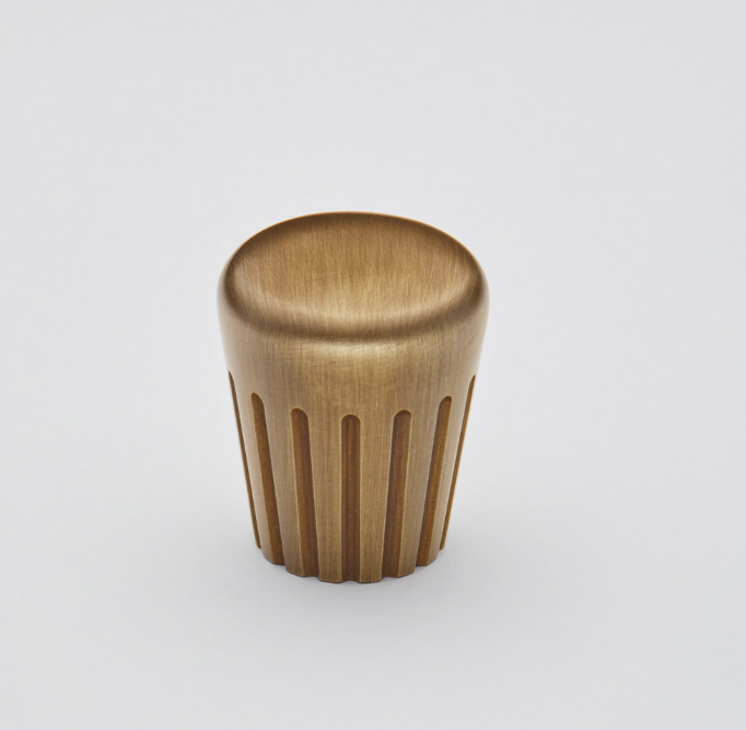 Brushed brass cabinet knob with fluted design, representing premium Georgian door ironmongery with timeless decorative appeal.