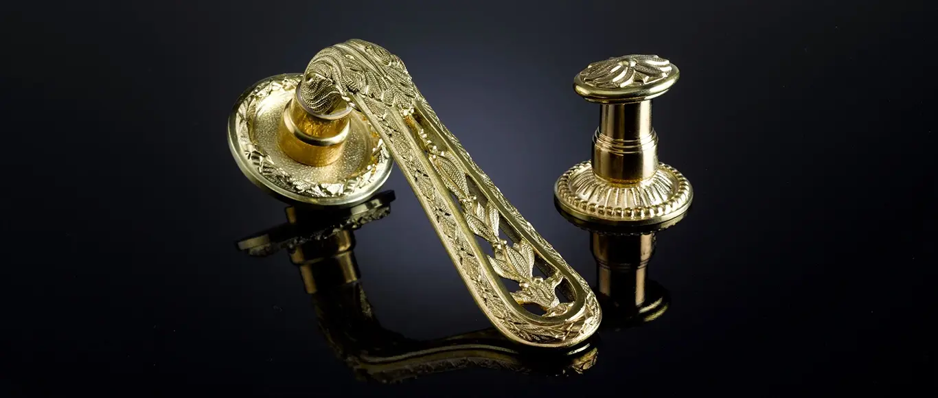 A Louis XVI hand-crafted door handle which shows the art of hand-crafted ironmongery.