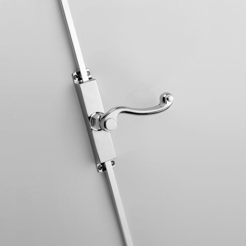 Decorative cremone bolts fitted on cabinet doors inspired by French door hardware, showcasing elegant design and secure locking mechanism.